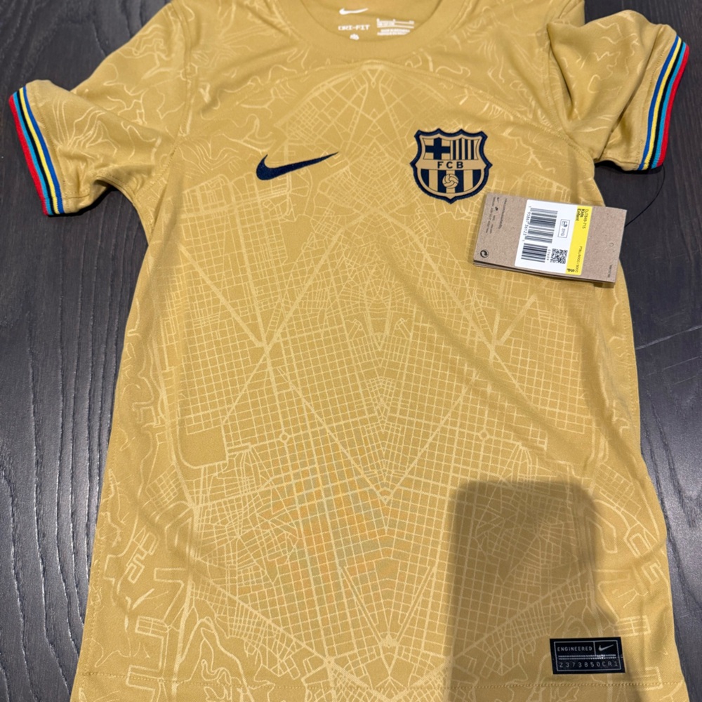 Nike FC Barcelona 2022/23 Men's Away Soccer Jersey in club gold